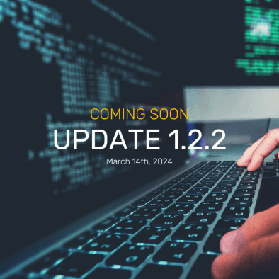 Text coming soon update 1.2.2 in front of laptop screen with programming code