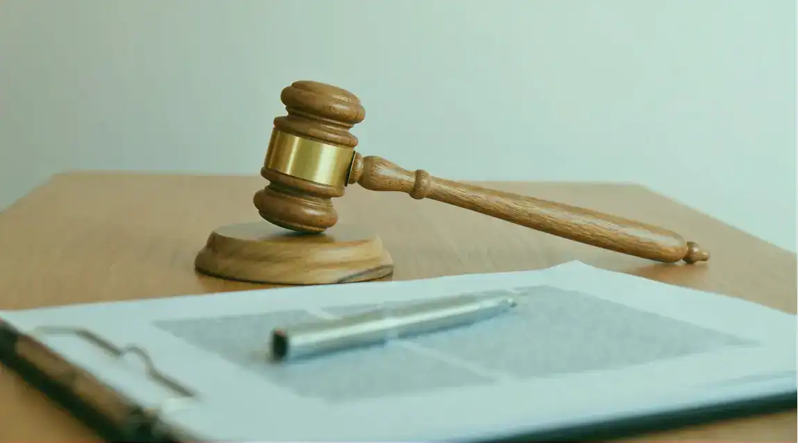 a judge hammer and a document for legal notice
