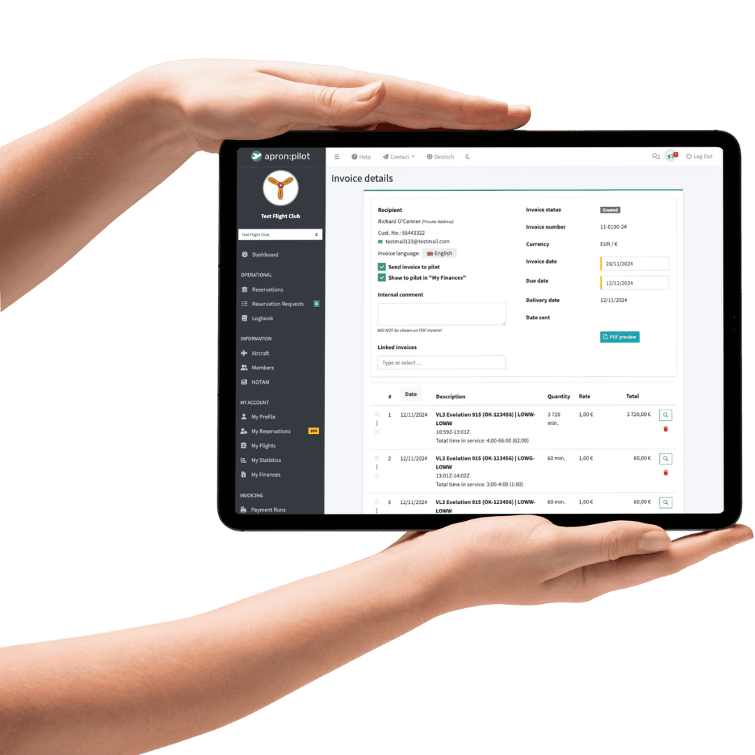 two hands holding an ipad which is showing an electronic invoice, generated within the application